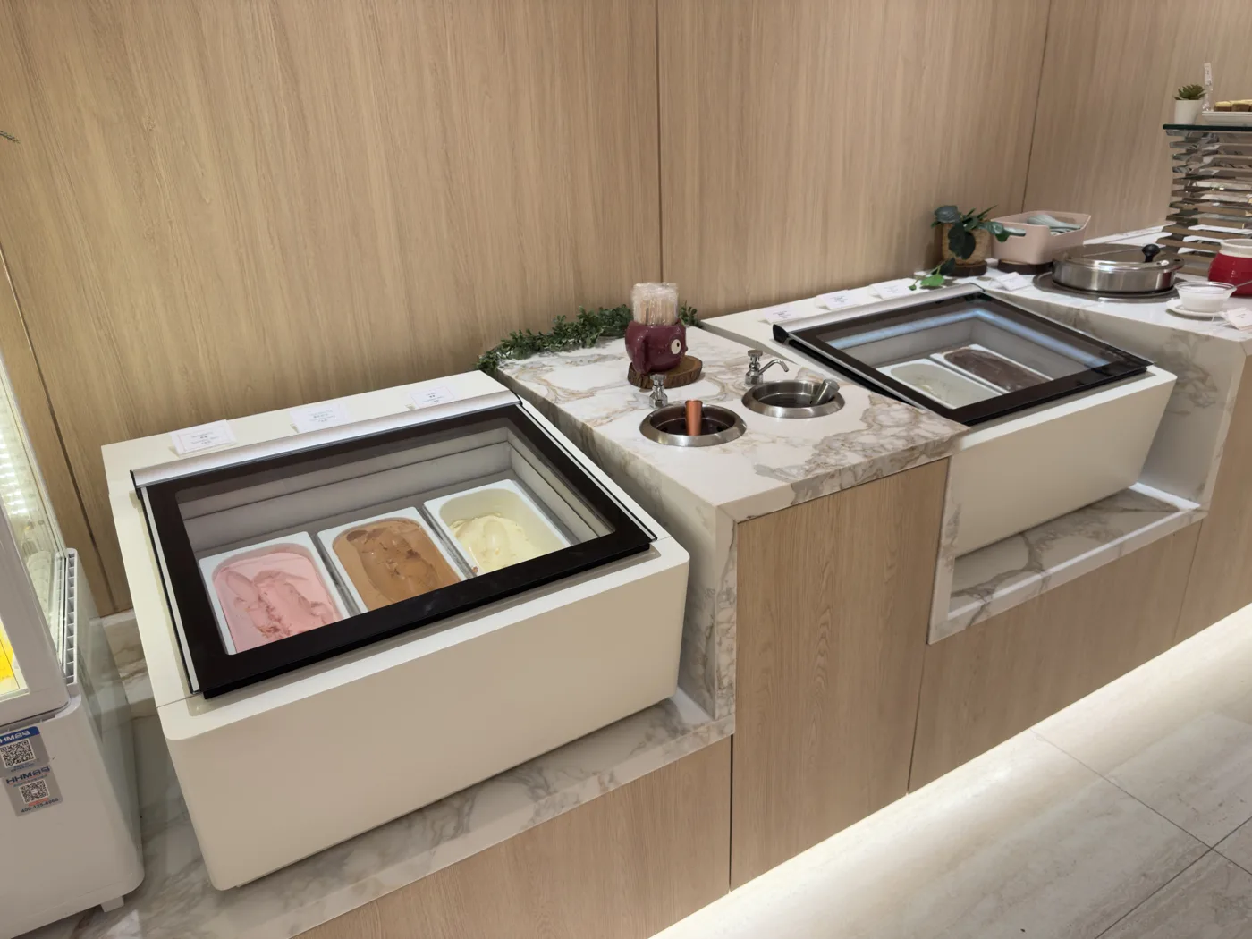 Gelato displays built into an elegant buffet line at a Singapore event