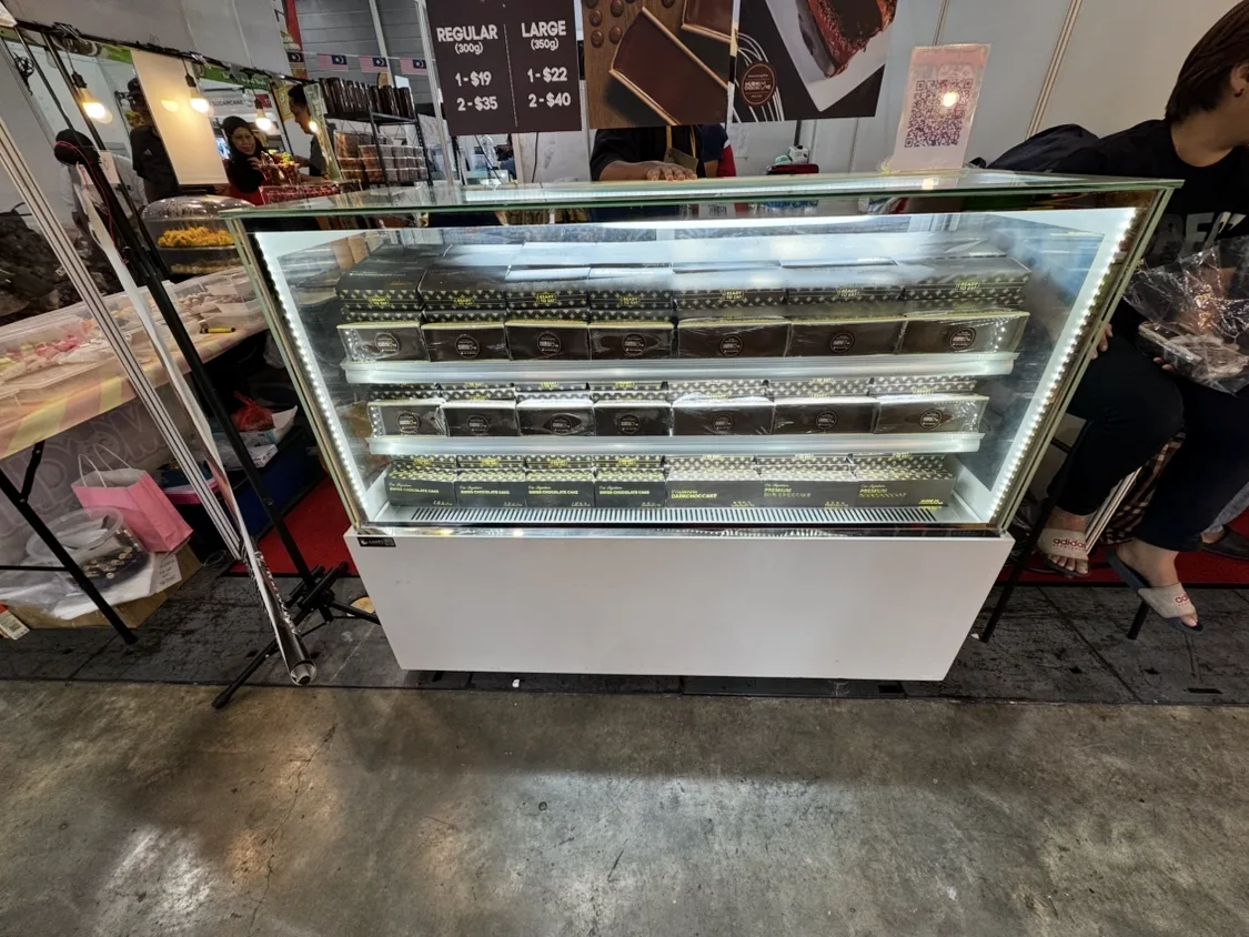 Kojima Three-Layer Cake Display Chiller B150L3-W-C (White LED / 150cm / White Finishing) in use at a real event